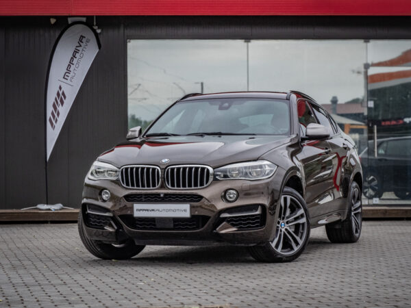 carro usado e semi-novo para venda. Interior em pele. BMW X6 M M50 d xDrive castanho. MPPAIVA-Automotive o seu stand automóvel de confiança